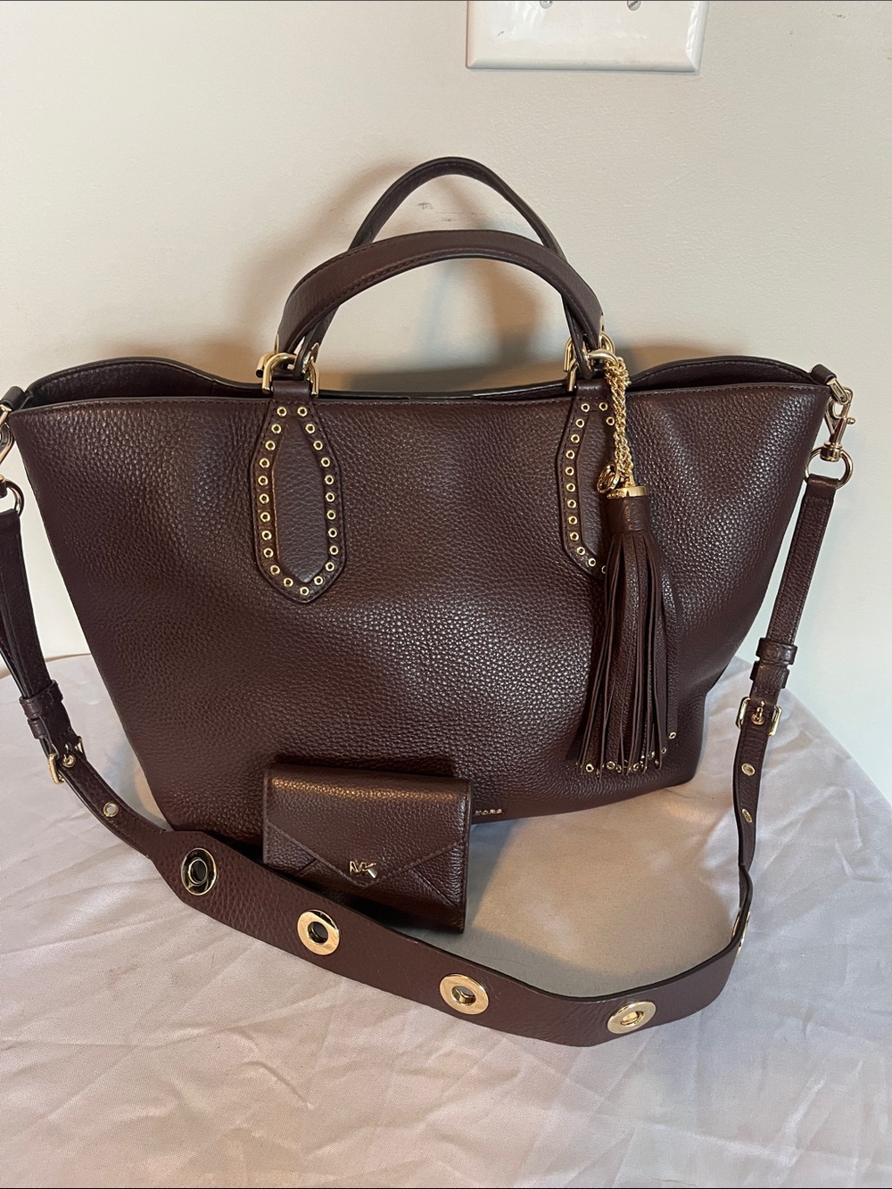 Michael Kors Dark Brown Pebbled Leather handbag with Tassel matching wallet